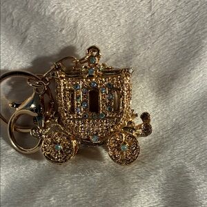 Keychain or Bag Charm in a Stage Coach Carriage w/pretty blue crystals. NWOT